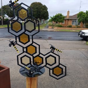 Garden Art-" Bees and Honeycomb" on cypress plinth